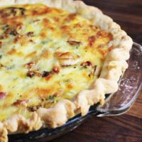 This easy spring quiche with leeks and bacon is a family favorite, and is perfect for any meal from breakfast to dinner.