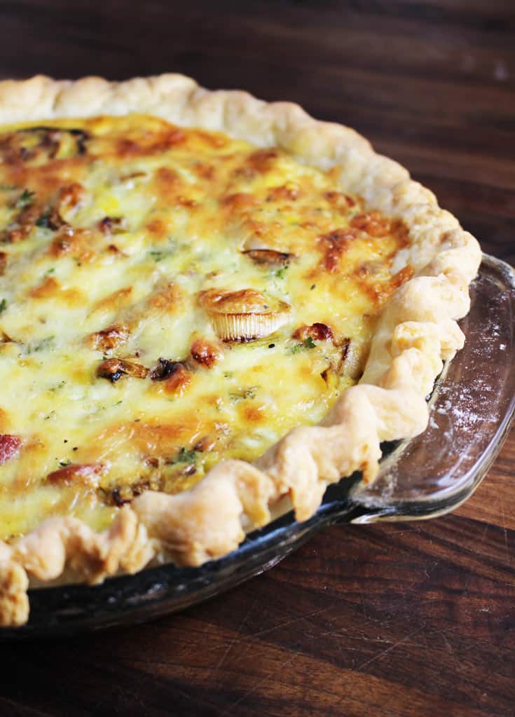 This easy spring leek and bacon quiche is a family favorite, and is perfect for any meal from breakfast to dinner.