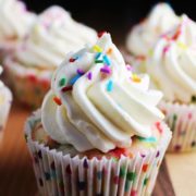 Homemade funfetti cupcakes with vanilla frosting and sprinkles