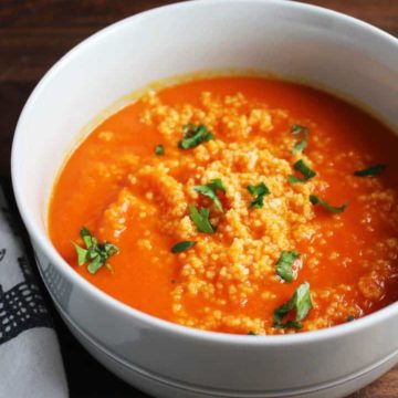 This beautiful, bold soup gets a ton of flavor from harissa, and is extra satisfying on a chilly fall evening with the amazing addition of a couscous swirl.