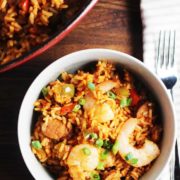 Overhead view of chicken, shrimp and sausage jambalaya in a bowl