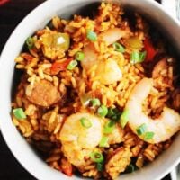 Overhead view of chicken, shrimp and sausage jambalaya in a bowl