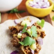 Al pastor style beef taco with toppings