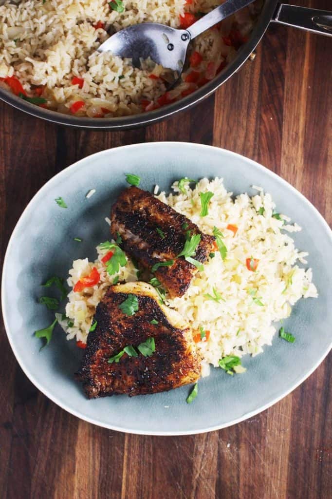 Overhead view of Cajun blackened fish recipe with rice on a plate