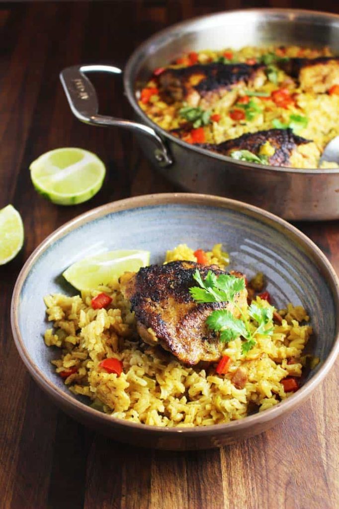 One pot Cuban chicken and rice in a shallow bowl
