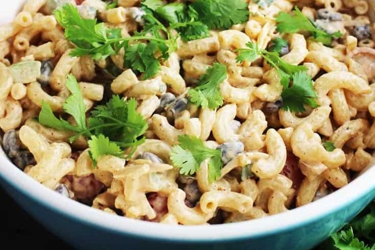 Creamy taco macaroni salad in a large serving bowl