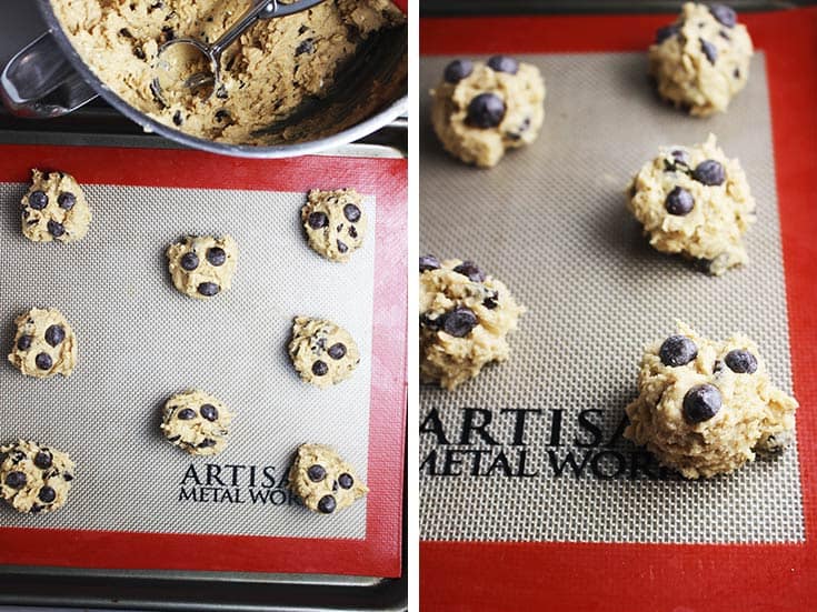 balls of cookie dough for oatmeal chocolate chip cookies with peanut butter on a baking sheet with silicone baking mat