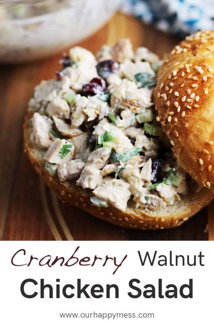 Cranberry walnut chicken salad inside a sesame seed kaiser roll