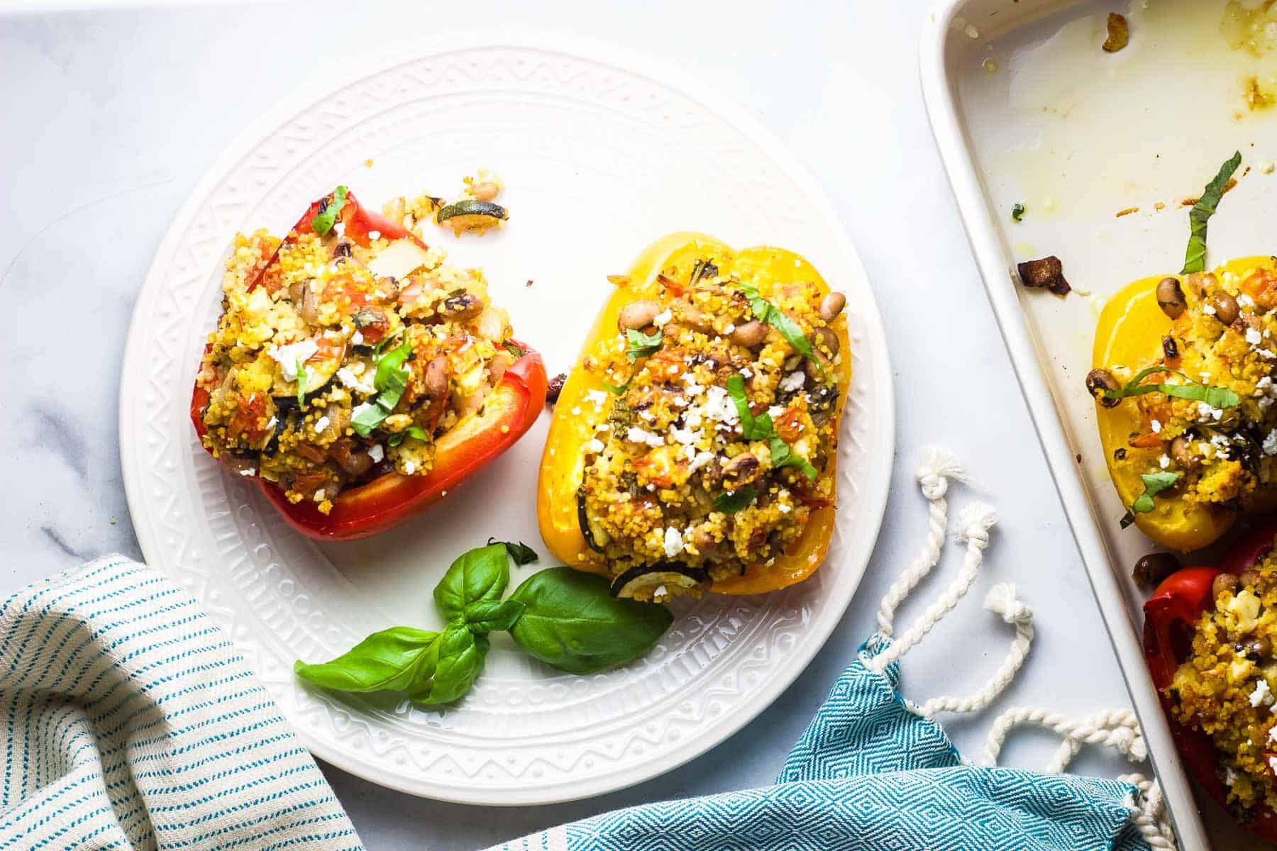 two stuffed peppers on a plate