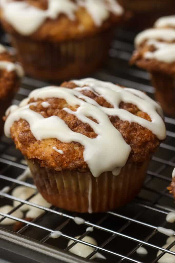 cinnamon roll muffins lined on a tray.