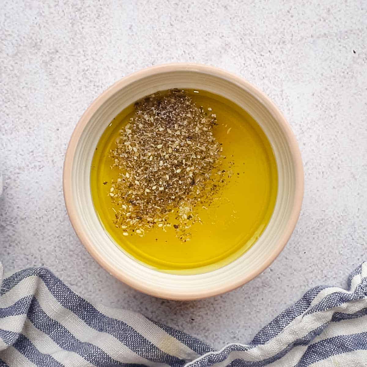 combining ingredients for the lemon dressing in a small bowl