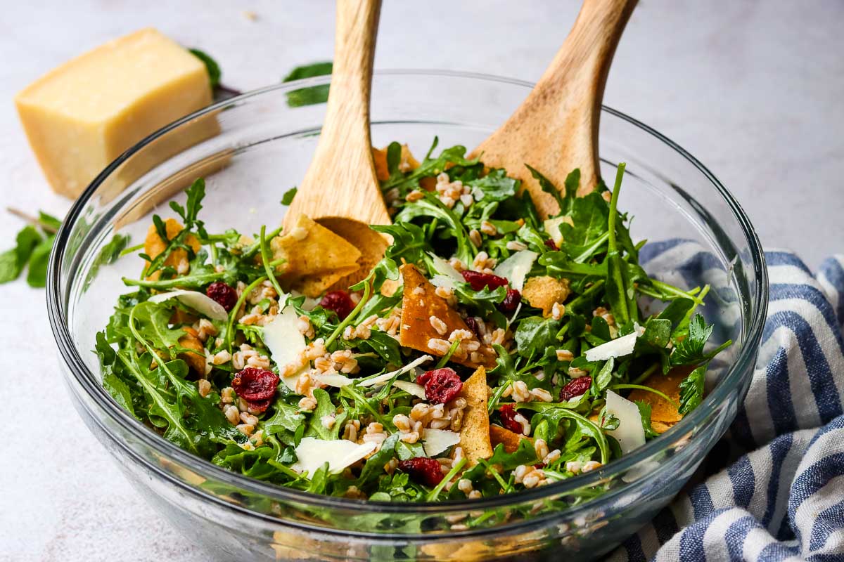 mixing together the ancient grains salad