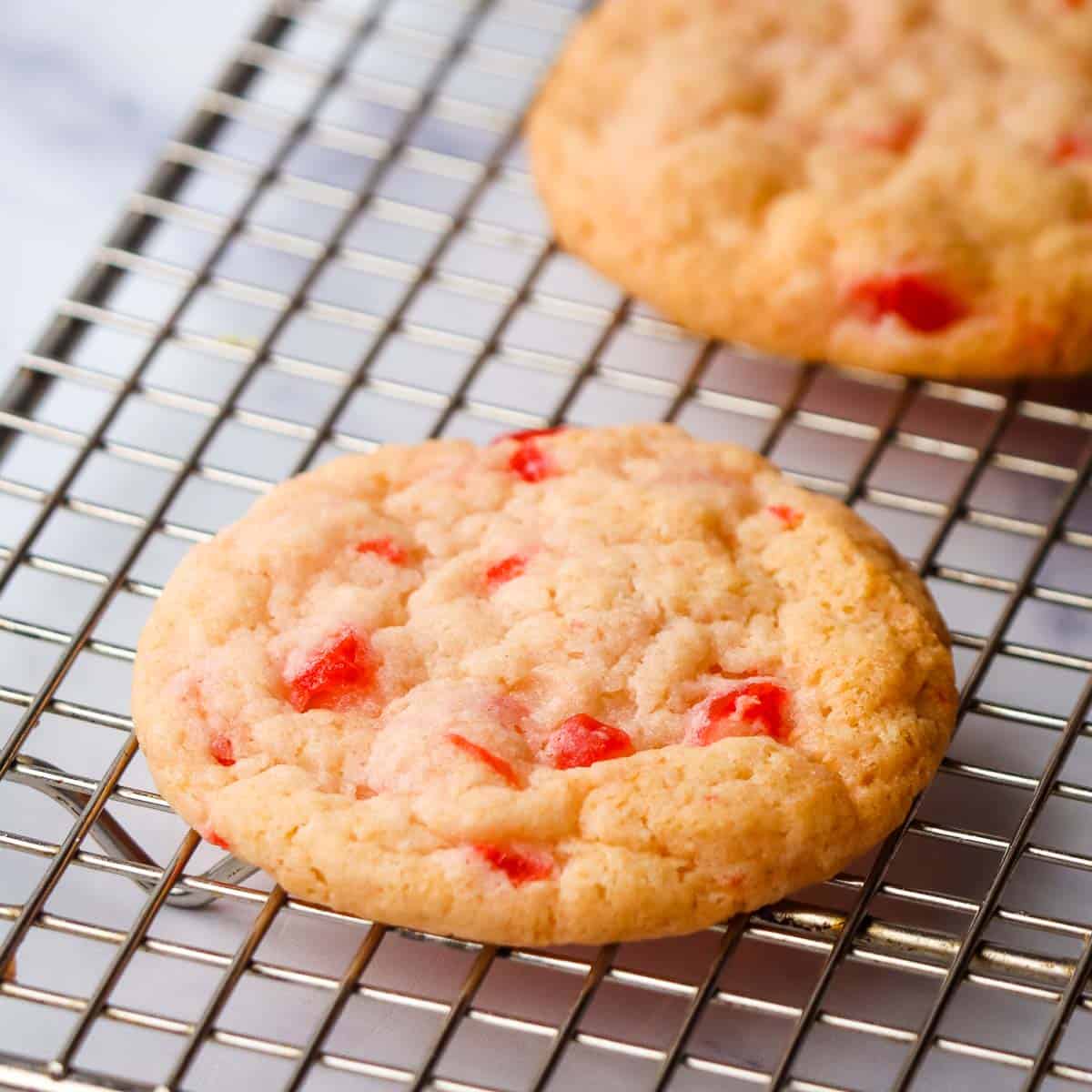 cherry almond cookie on a cooling rack