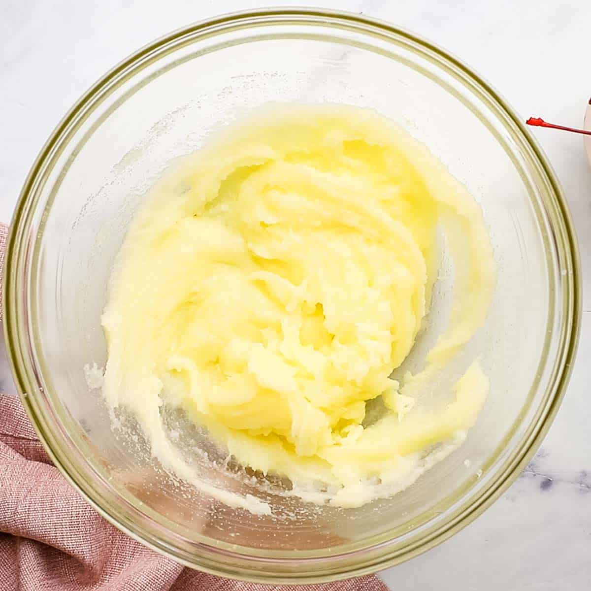 sugar, cream cheese, and melted butter whisked together in a bowl