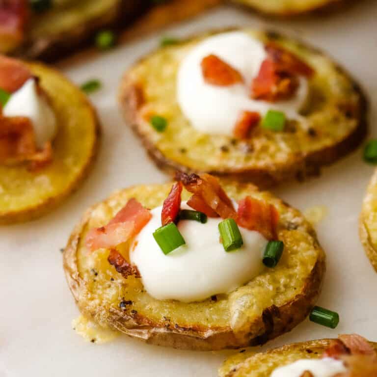 closeup of potato bites loaded with toppings