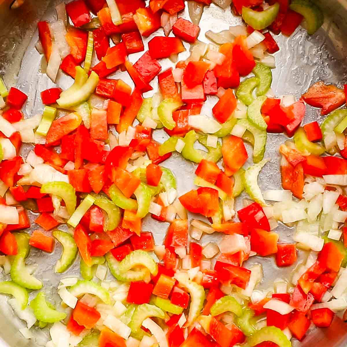 A pan of cooked celery, onion and bell pepper.