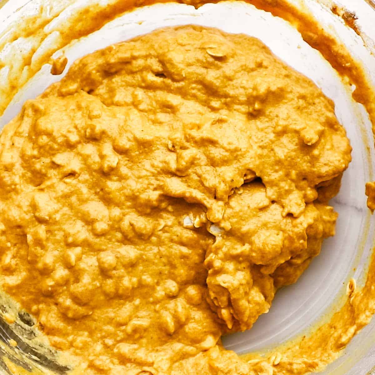 whisked muffin batter in a large bowl