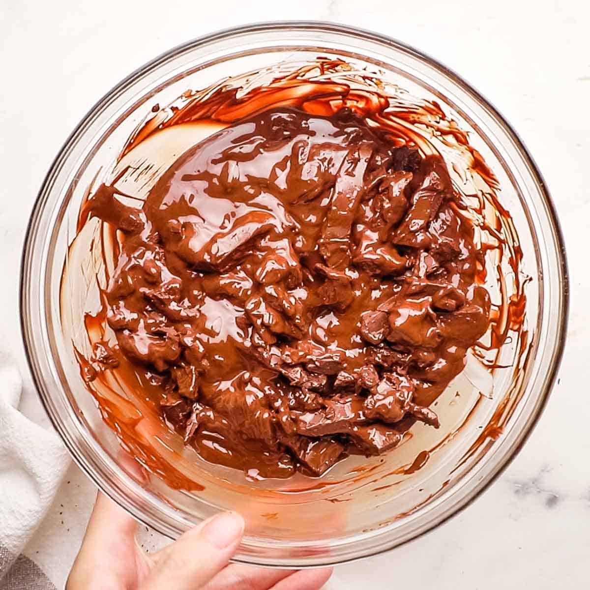 A bowl of partially melted chocolate.