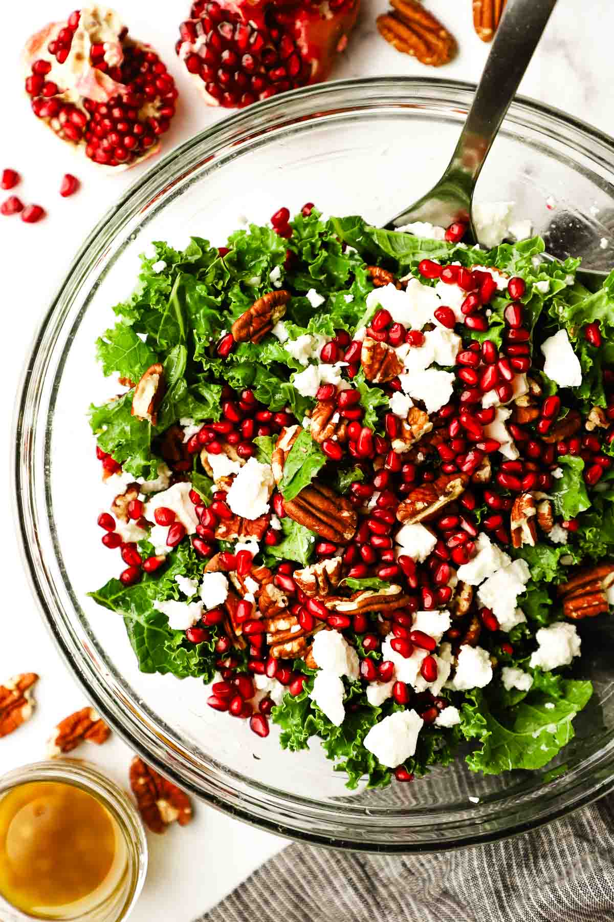 overhead view of a bowl of kale pomegranate salad