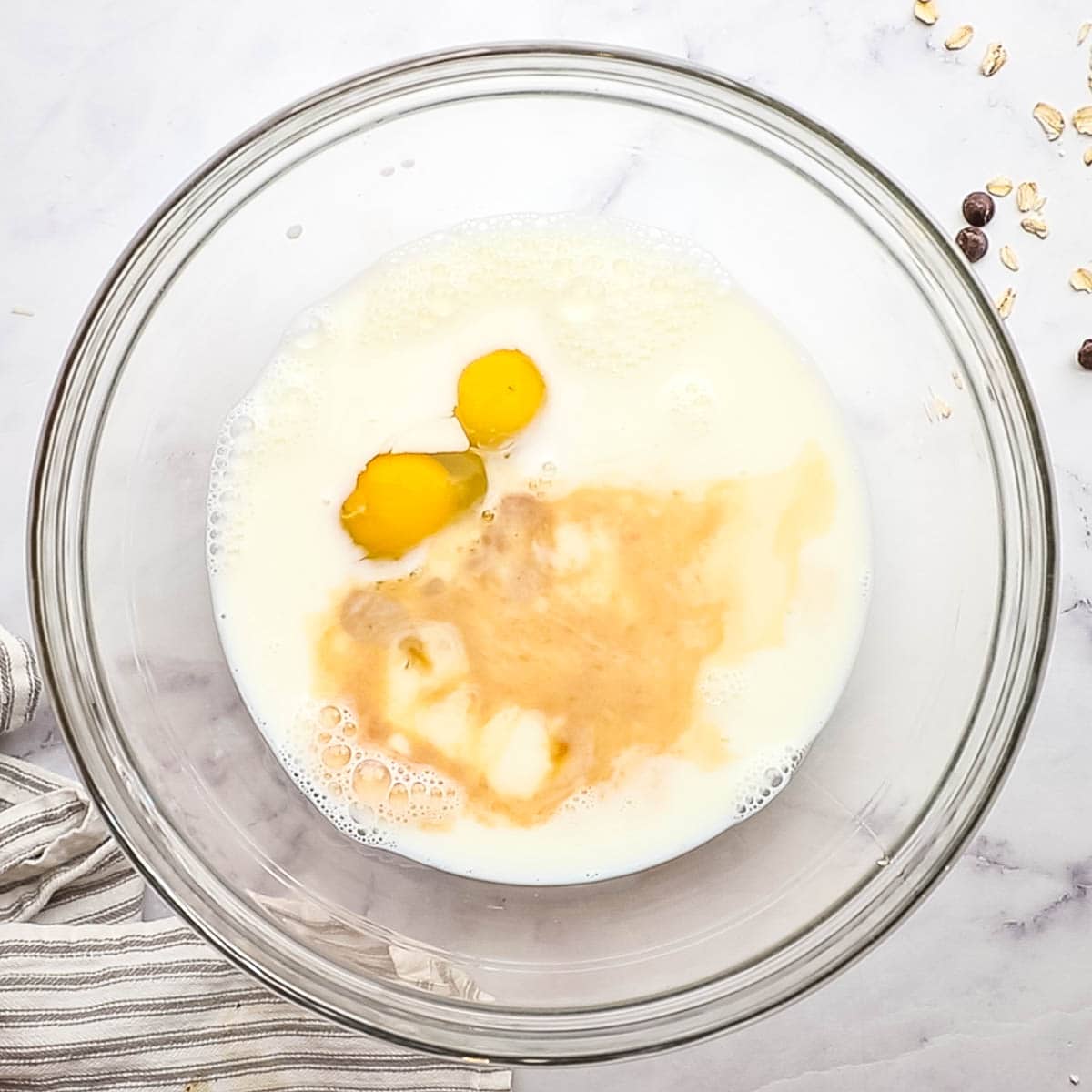 milk eggs and vanilla in a bowl