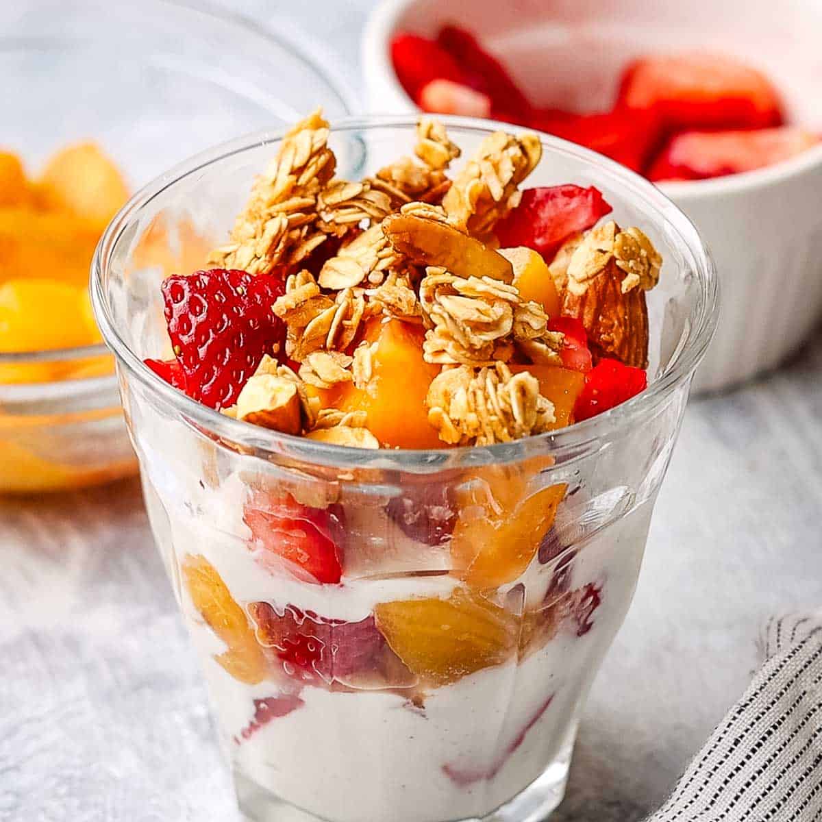 granola added on top if the fruit and yogurt layers