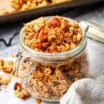 An open jar of honey almond granola.