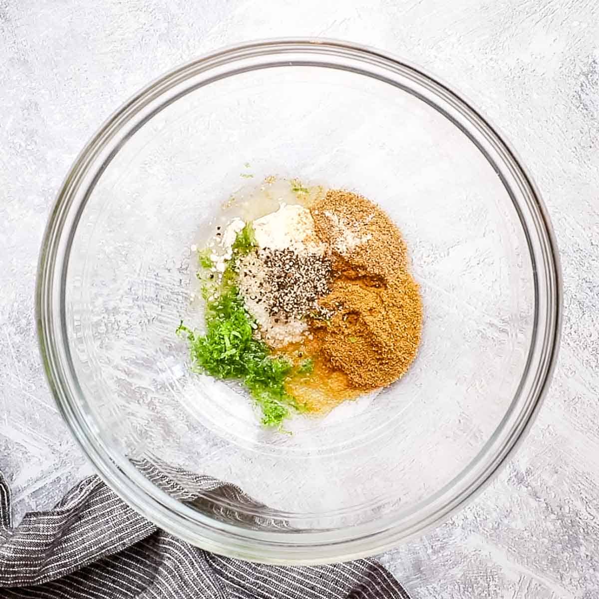 seasonings in a bowl for chicken thighs