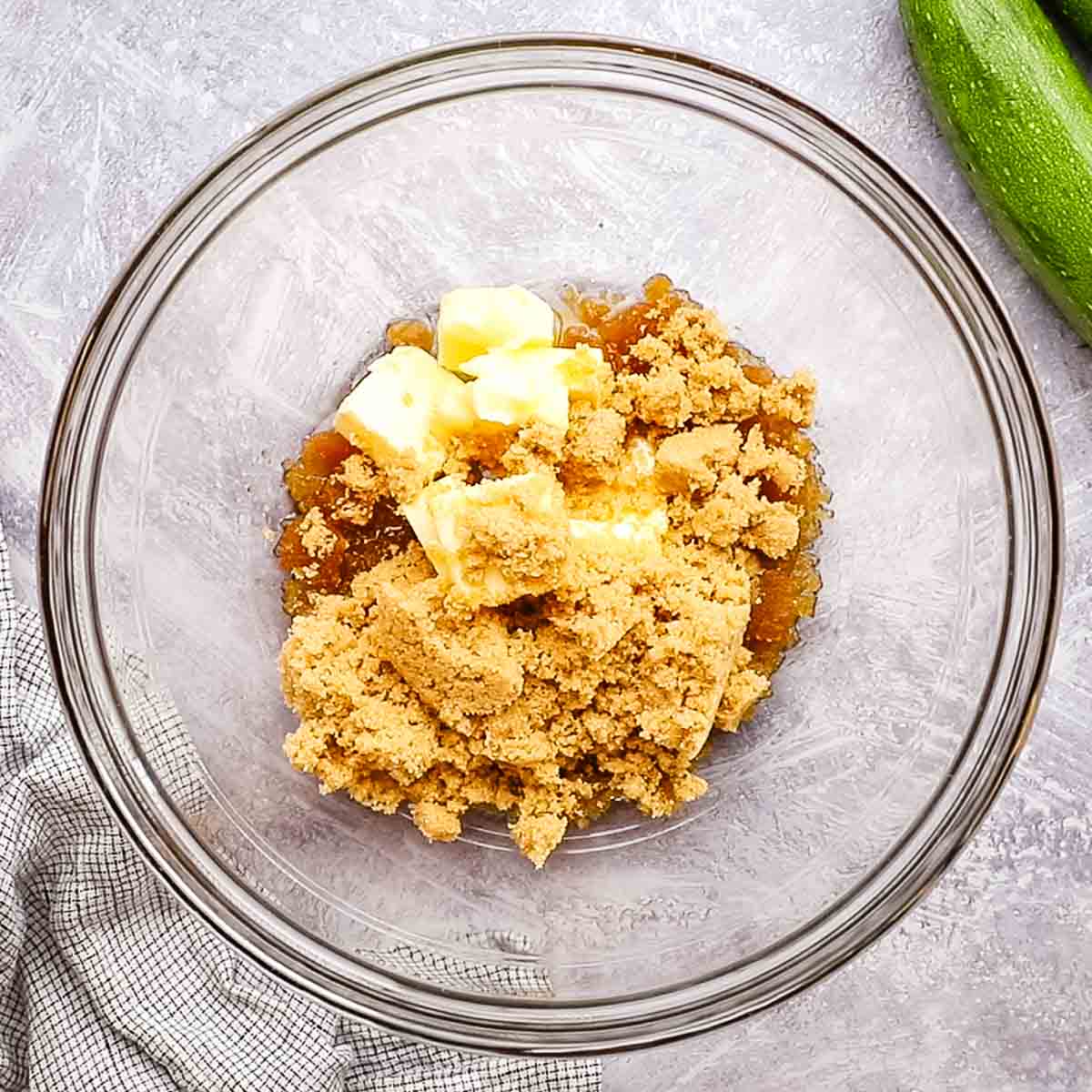 butter, oil, and brown sugar in a bowl