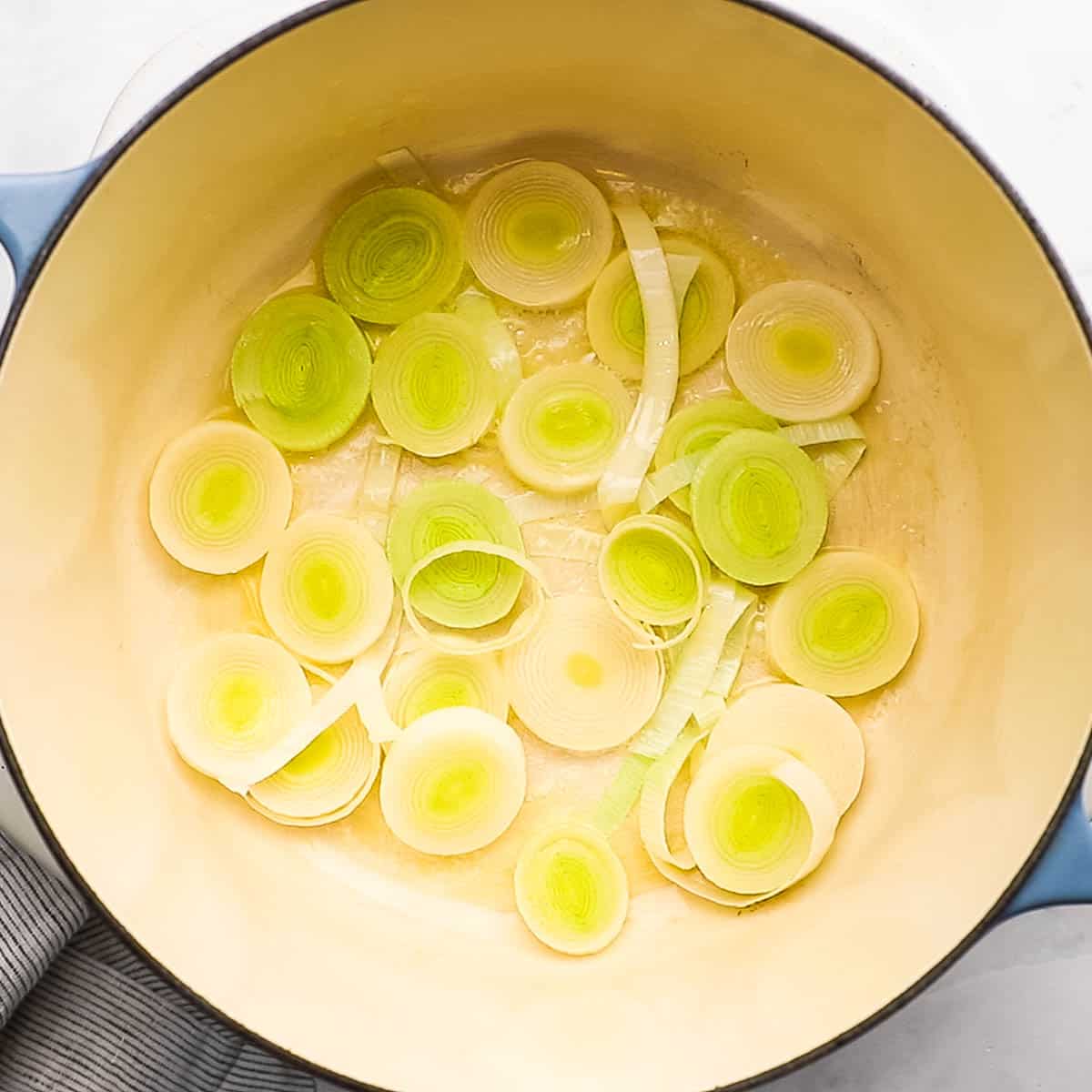 leeks and butter added to the pot