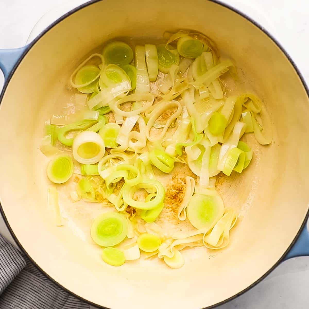 softening leeks in a pot