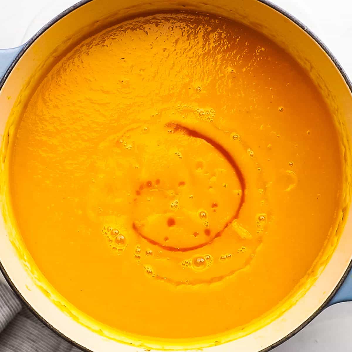 orange juice, lemon juice, and hot sauce added to the soup