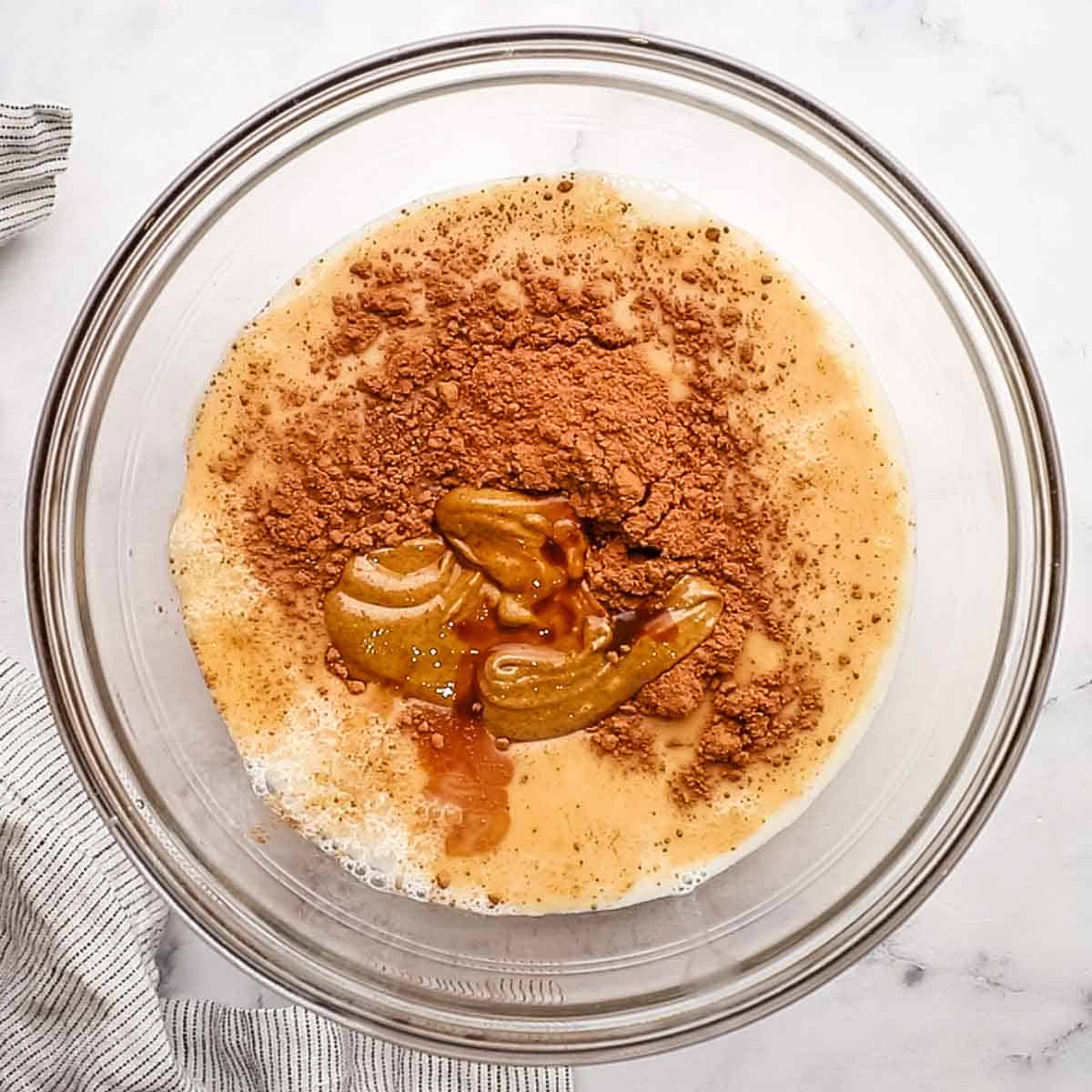 ingredients for overnight oats added to a bowl