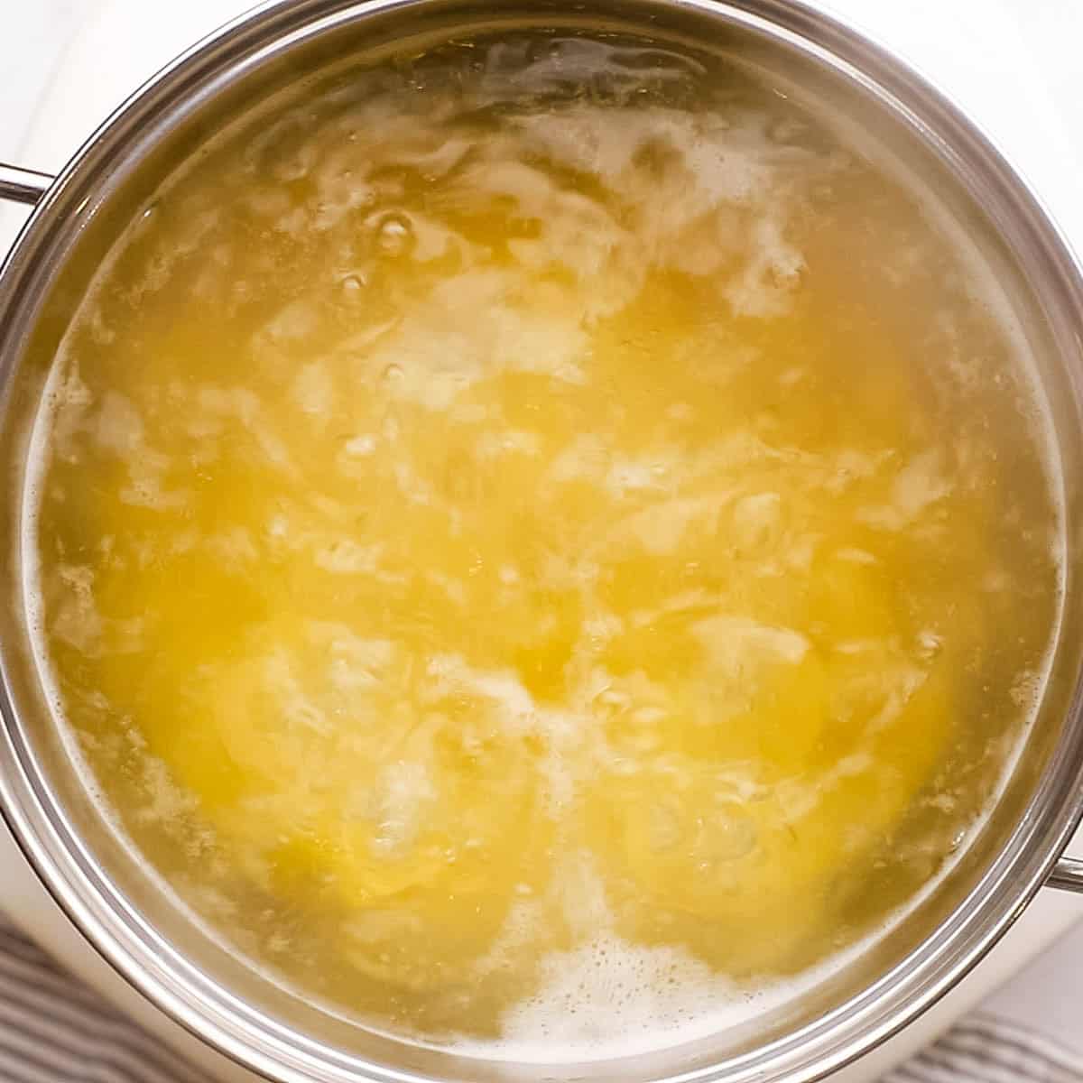 boiling pasta in a pot