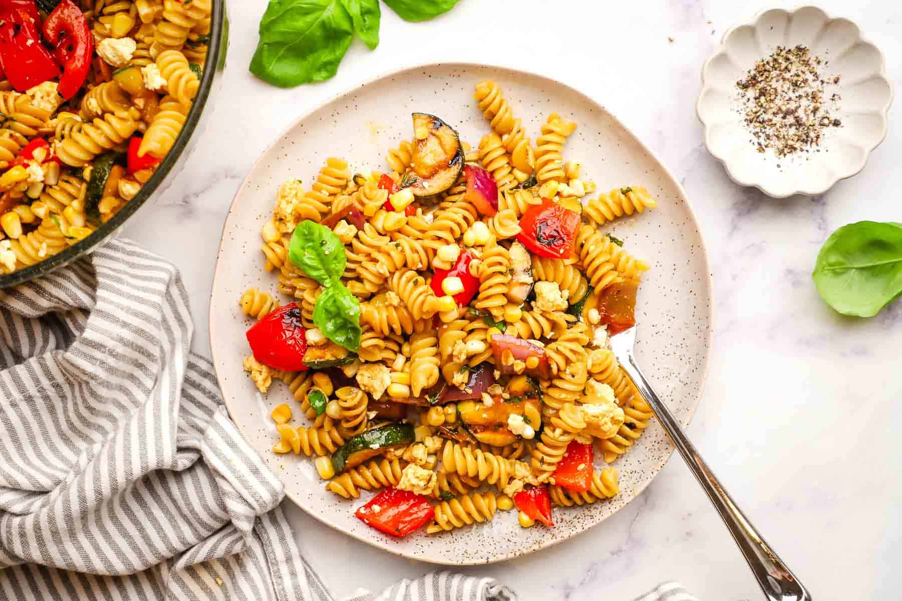 balsamic pasta salad with grilled vegetables served on a plate