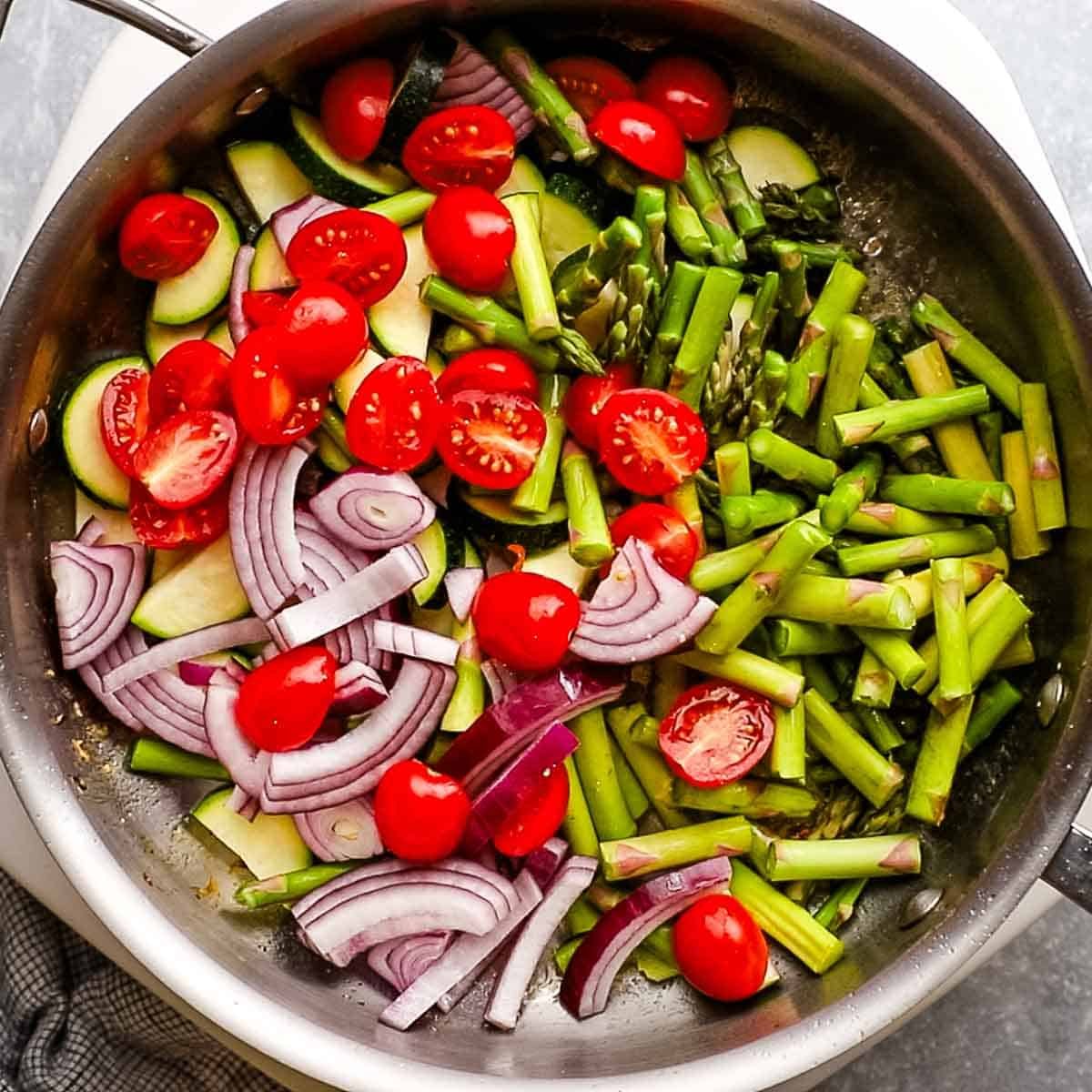 chopped veggies added to the skillet