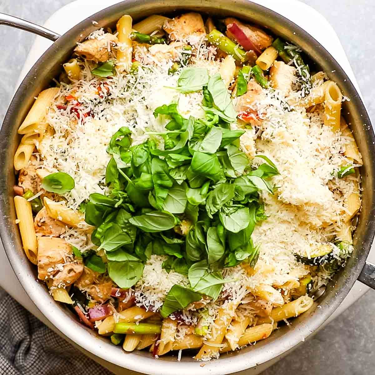 parmesan cheese, heavy cream, basil, and lemon juice in the pan