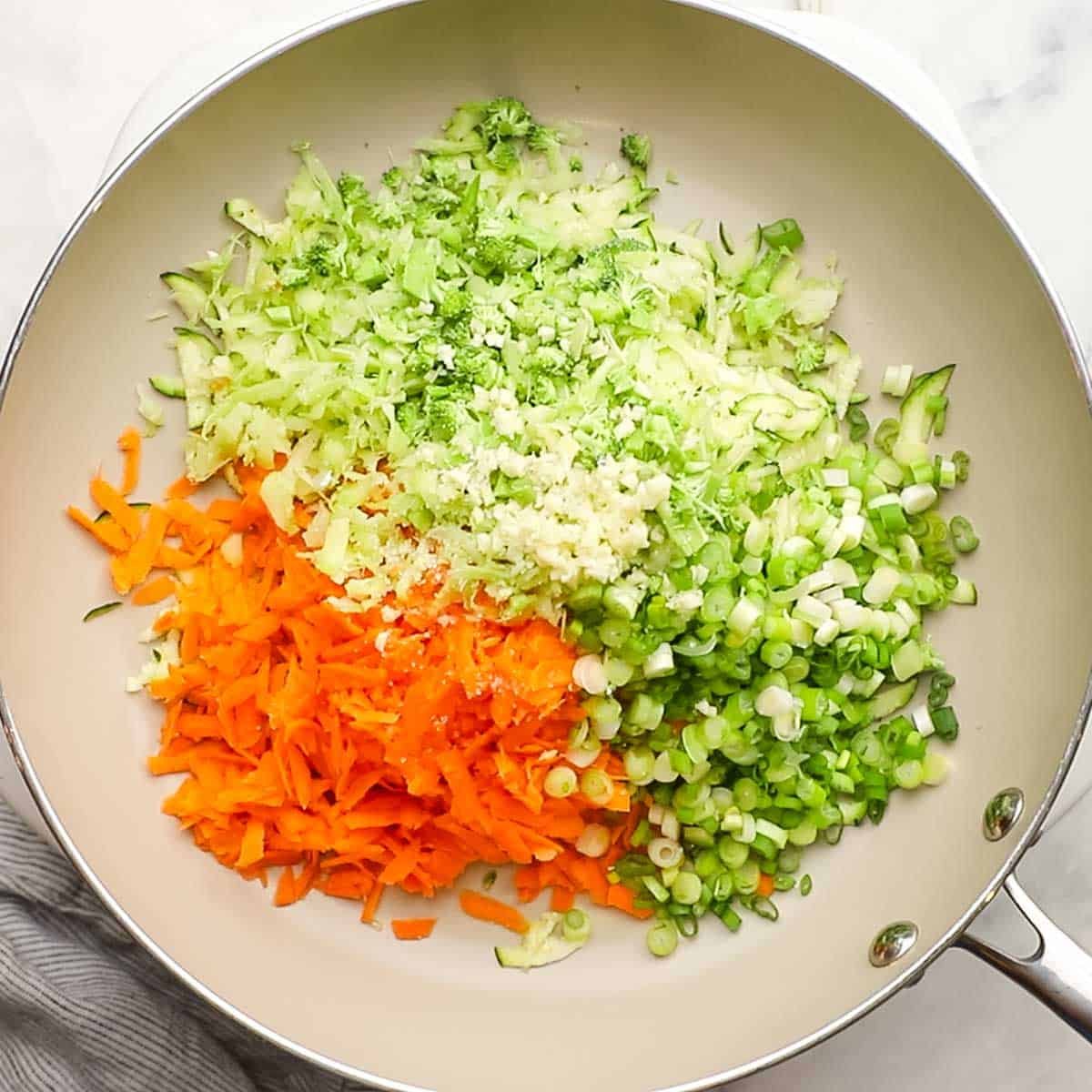 shredded veggies in a skillet