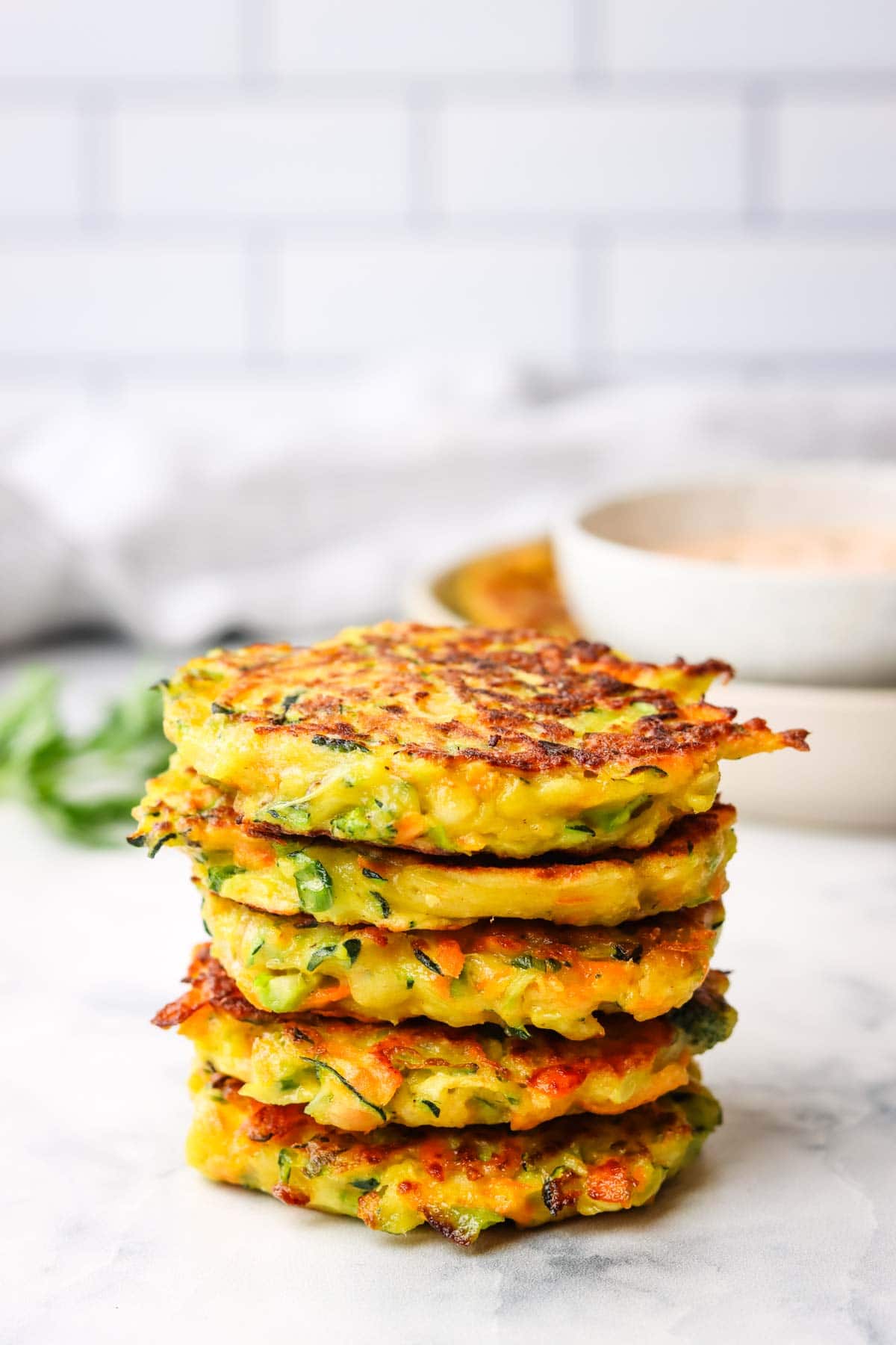 a stack of veggie fritters on a plate