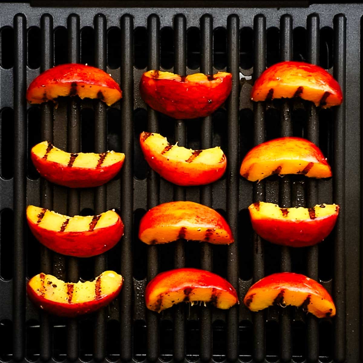 peaches with grill marks on the grill