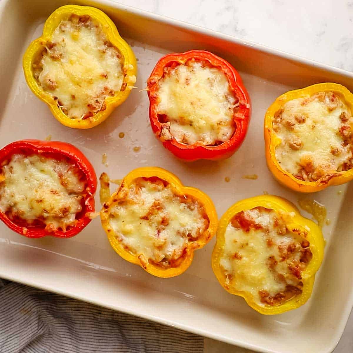 ground turkey stuffed peppers baked in a dish
