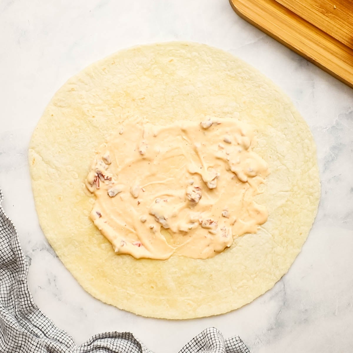 chipotle mayo spread on a wrap