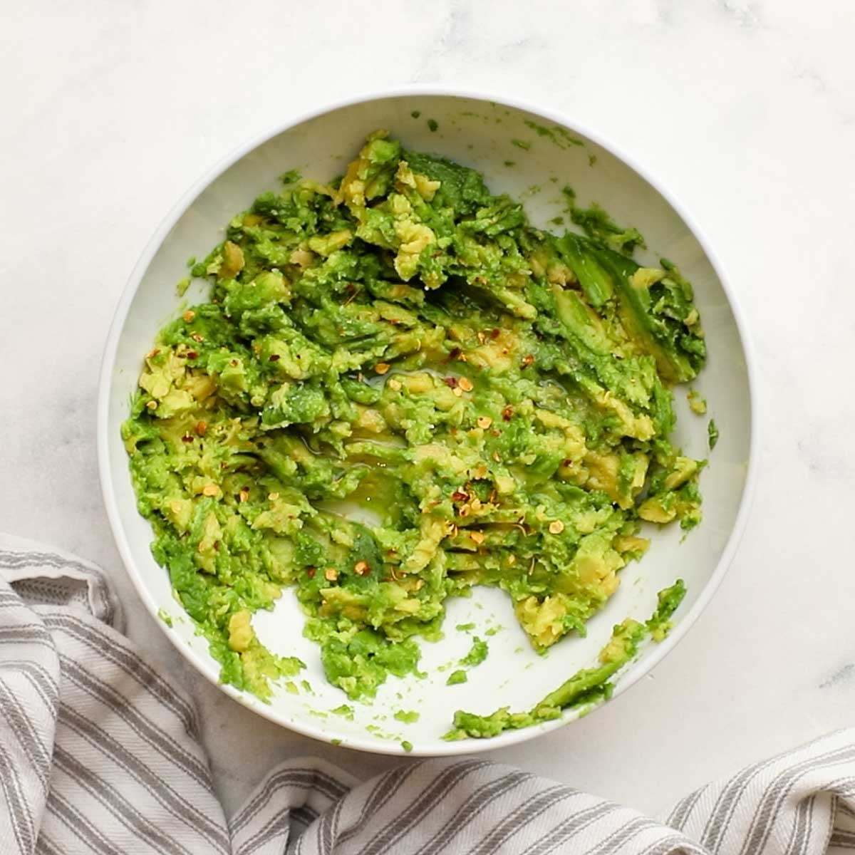 mashed avocados in a bowl