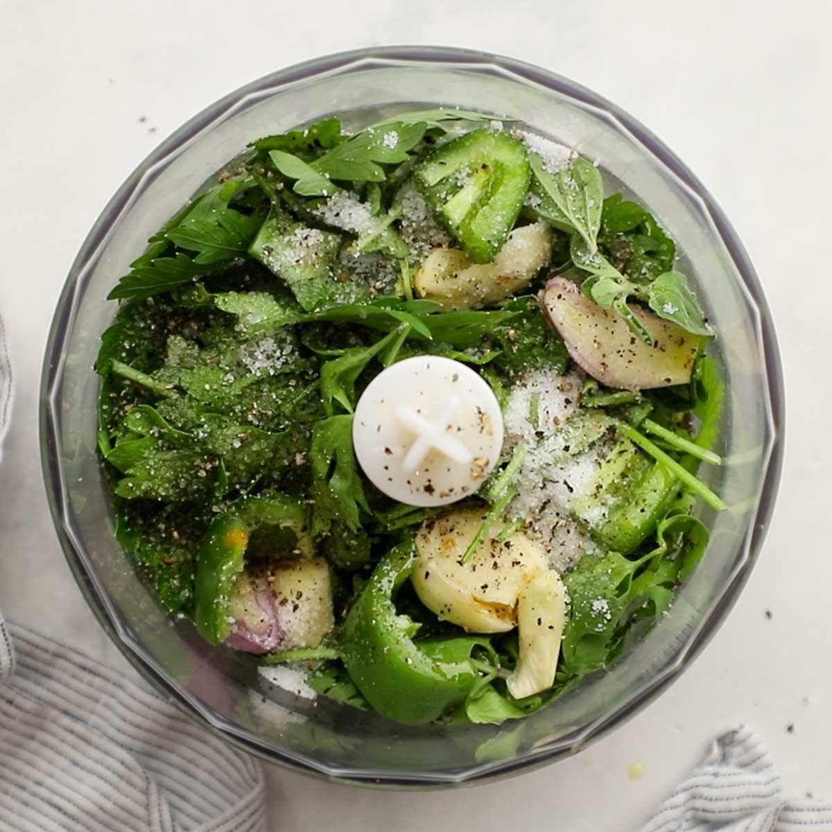 ingredients for cilantro chimichurri in a food processor