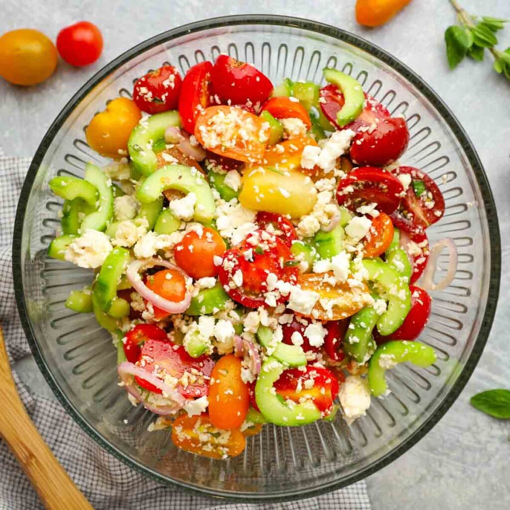 tomato cucumber feta salad in a bowl