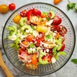 tomato cucumber feta salad in a bowl