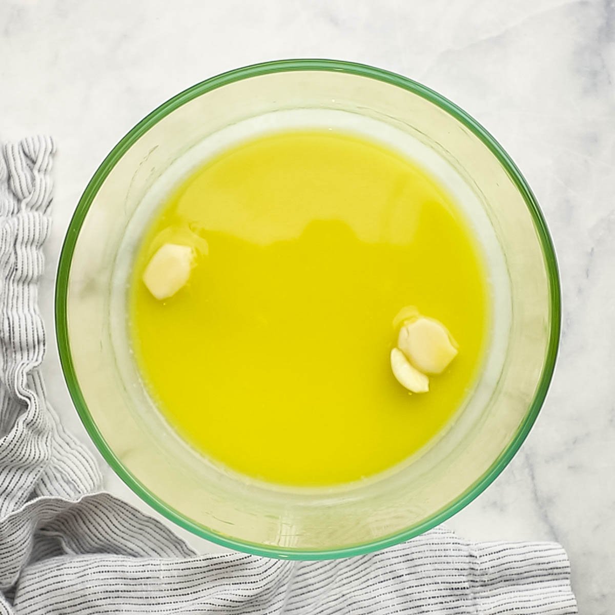 marinade ingredients for chicken in a glass container