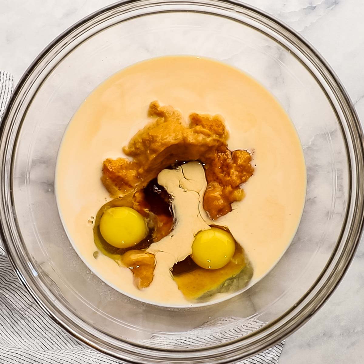 wet ingredients for pumpkin baked oatmeal in a bowl