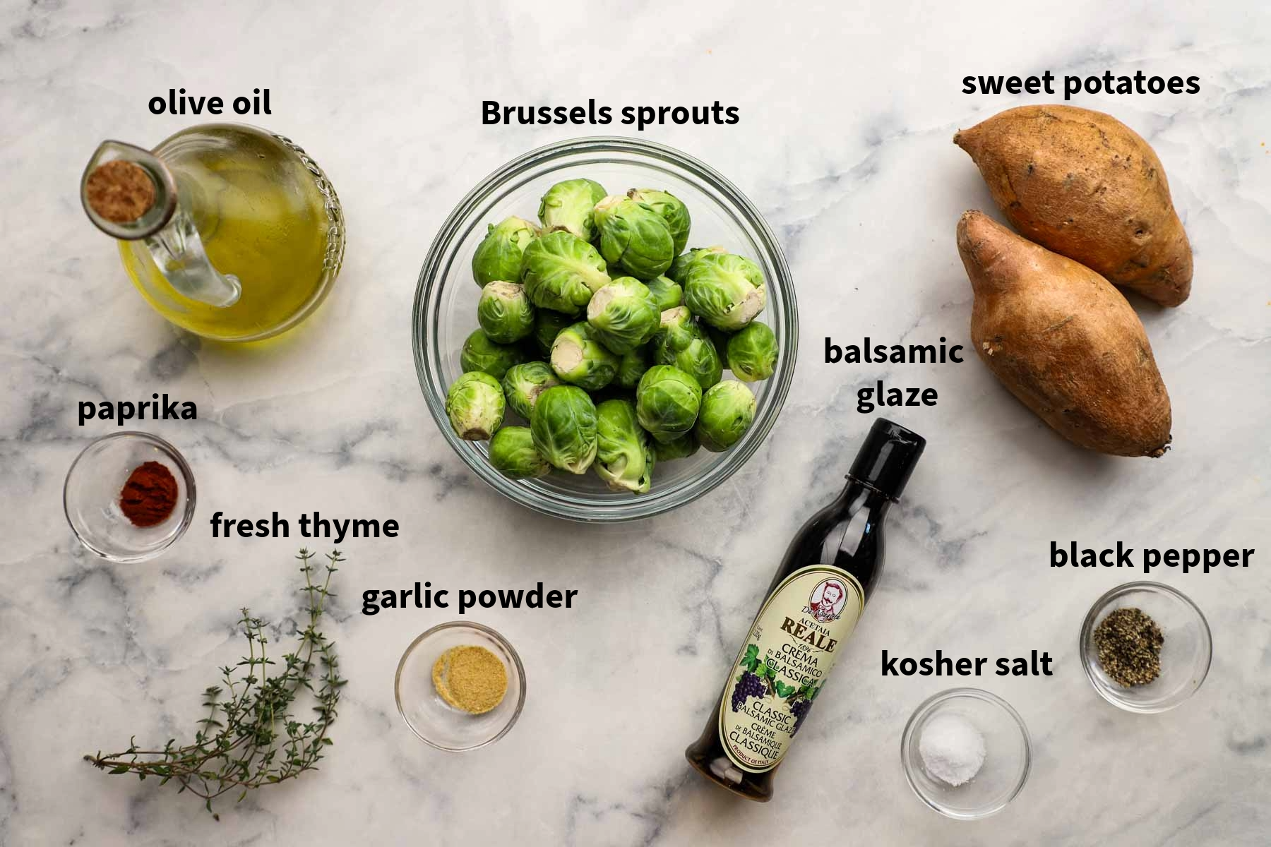 ingredients used to make roasted Brussels sprouts and sweet potatoes pictured and labelled