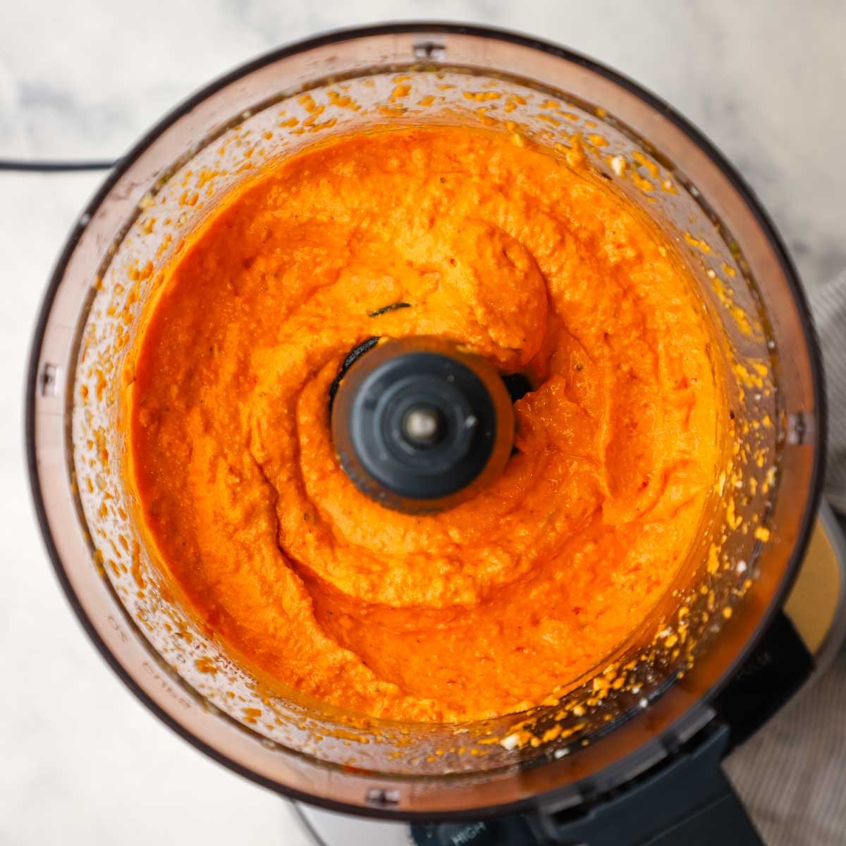 feta and roasted red pepper dip in a food processor