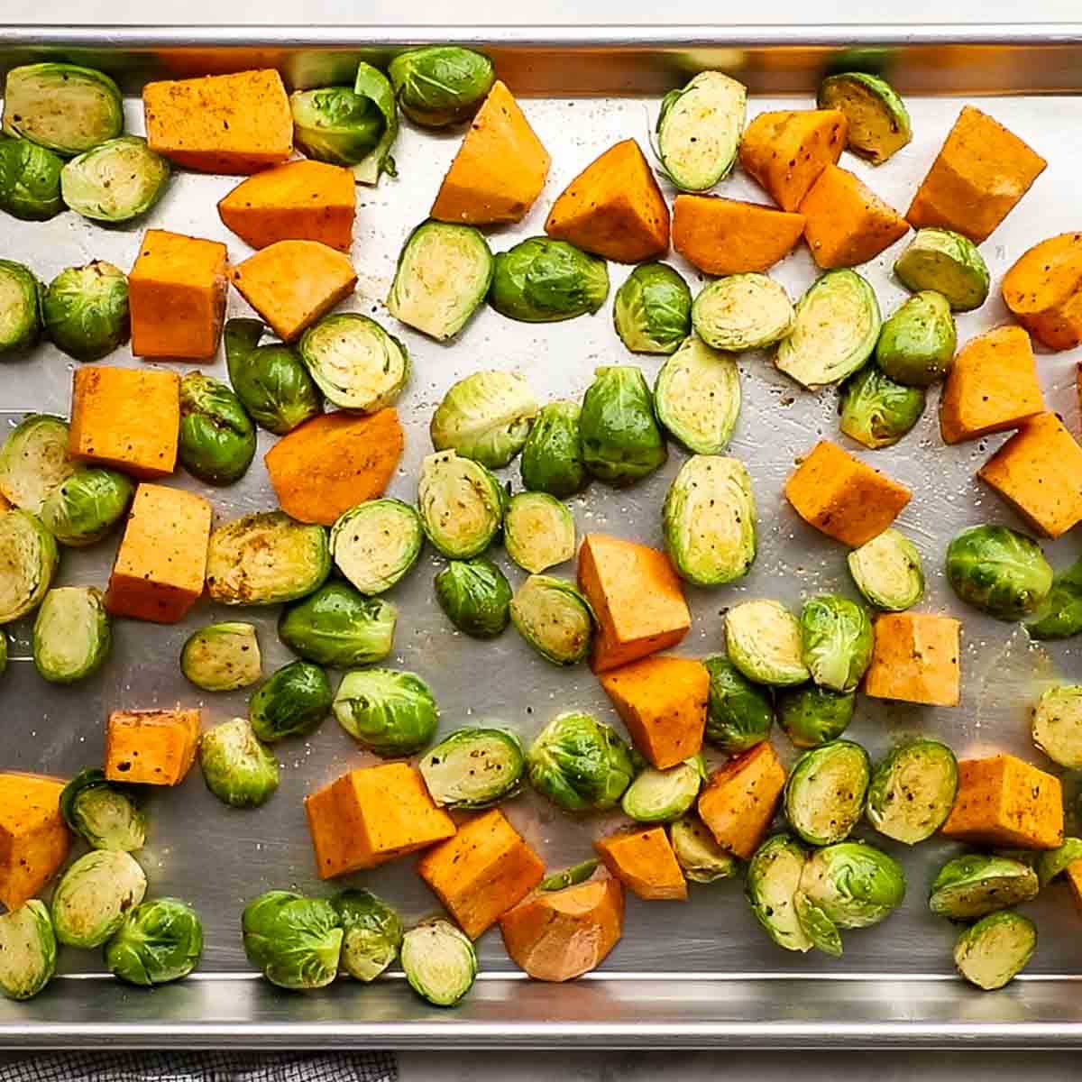 veggies spread out on a baking sheet